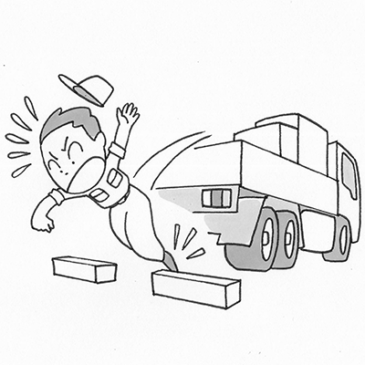 トラックの後あおりから飛び降りた際、車止めブロックにつまずき転倒しそうになった