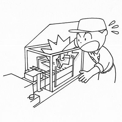 箱詰機を使用中、詰まった製品を取り除こうとしたところ、手が挟まれそうになった